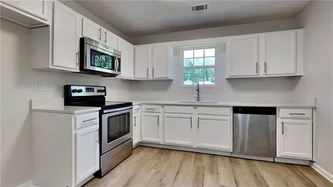 Kitchen - 10961 Big Sky Dr, Hampton, GA 30228 photo 2 of 2