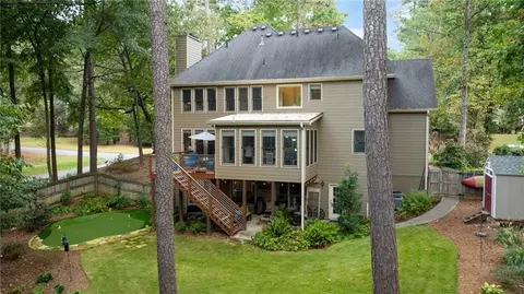 Exterior - 3690 Hermitage Dr, Berkeley Lake, GA 30096 photo 2 of 13