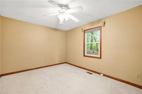Bedroom - 559 Farmbrook Trl NE, Kennesaw, GA 30144 photo 1 of 7