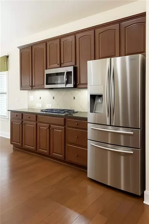 Kitchen - 2231 Cain Commons Dr, Dacula, GA 30019 photo 2 of 2