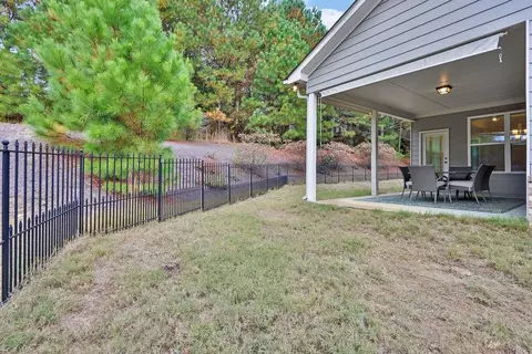 Exterior - 1730 Riverpark Dr SE, Dacula, GA 30019 photo 6 of 8