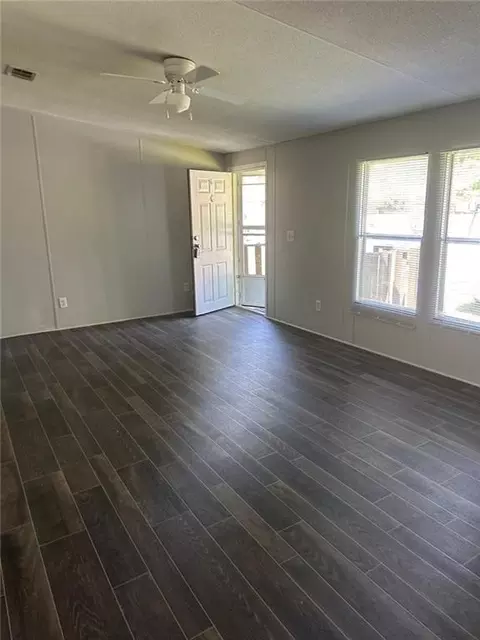 Living - 209 Hoey St, Thomson, GA 30824 photo 1 of 3