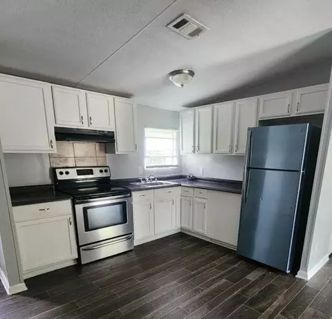 Kitchen - 209 Hoey St, Thomson, GA 30824 photo 1 of 1