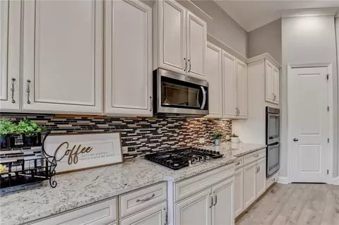 Kitchen - 3907 Rustic Pine Ln, Buford, GA 30518 photo 8 of 11