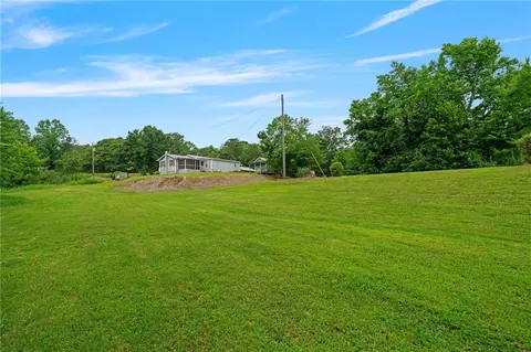 Exterior - 404 Davis Rd W, Fairmount, GA 30139 photo 11 of 13