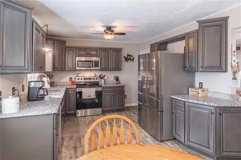 Kitchen - 867 Windward Rd, Winder, GA 30680 photo 7 of 8