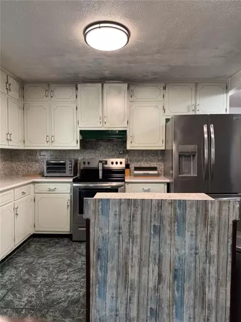 Kitchen - 2273 Hampton Trl SE, Conyers, GA 30013 photo 3 of 3