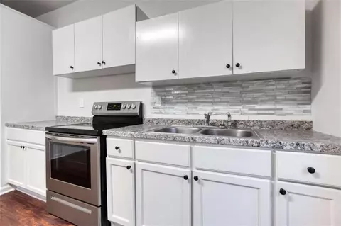 Kitchen - 126 6th St, Monroe, GA 30655 photo 2 of 2