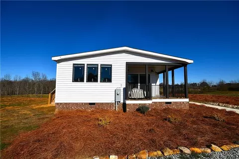 Exterior - 703 Addison Rd, Buchanan, GA 30113 photo 6 of 8