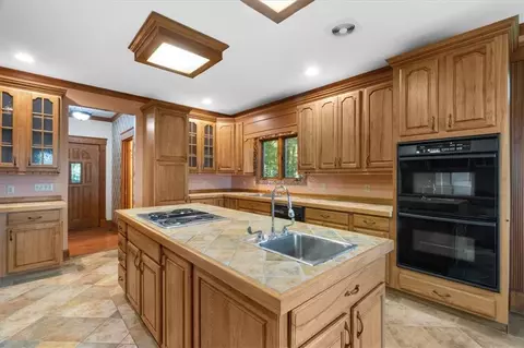 Kitchen - 576 Apache Trl, Chatsworth, GA 30705 photo 5 of 6