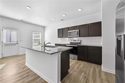 Kitchen - 1102 Lossie Ln, Grayson, GA 30017 photo 3 of 4