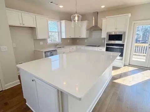 Kitchen - 4405 Easter Lily Ave, Buford, GA 30519 photo 2 of 3