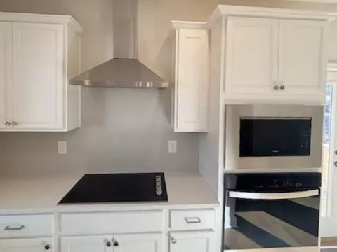 Kitchen - 4405 Easter Lily Ave, Buford, GA 30519 photo 3 of 3