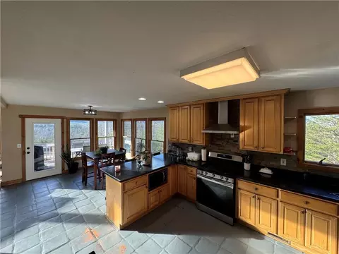 Kitchen - 459 E Valley Rd NE, Rydal, GA 30171 photo 2 of 2