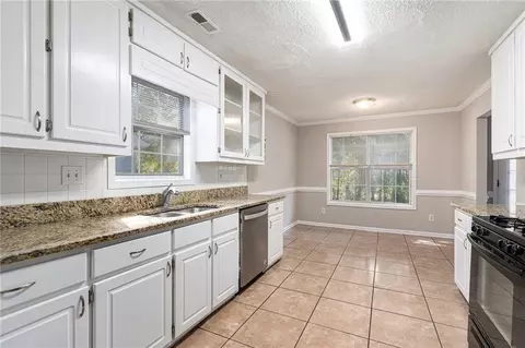 Kitchen - 10959 Thrasher Rd, Hampton, GA 30228 photo 2 of 3