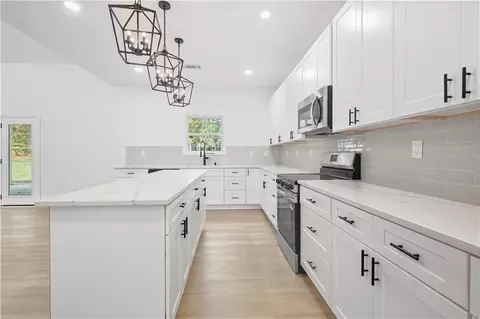 Kitchen - 1444 Red Cedar Rd, Commerce, GA 30530 photo 2 of 2