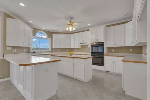 Kitchen - 12328 Edgewater Dr, Hampton, GA 30228 photo 1 of 2