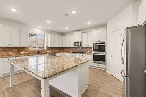 Kitchen - 75 Fanleaf Dr, Fairburn, GA 30213 photo 2 of 3