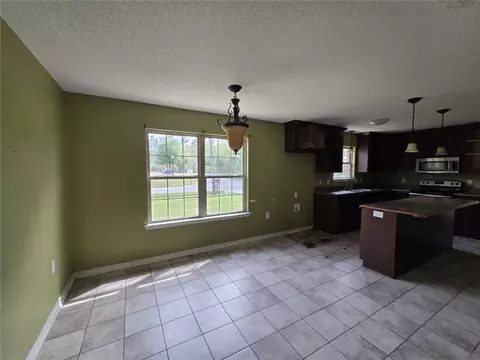 Living - 141 Mcrae St, Atmore, AL 36502 photo 4 of 4