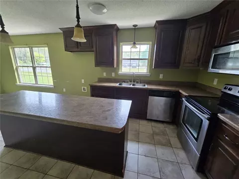 Kitchen - 141 Mcrae St, Atmore, AL 36502 photo 2 of 2