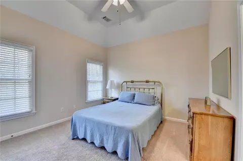 Bedroom - 7640 Stratton Pt, Suwanee, GA 30024 photo 9 of 12