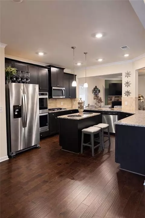Kitchen - 208 Sebastian Cv, Hampton, GA 30228 photo 1 of 2