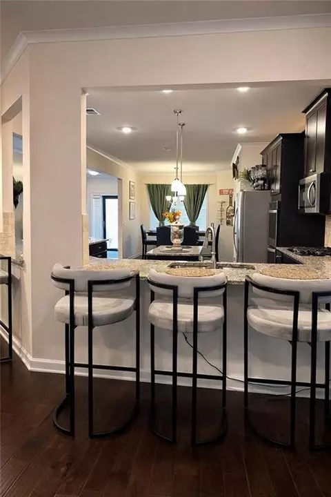 Kitchen - 208 Sebastian Cv, Hampton, GA 30228 photo 2 of 2