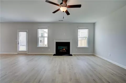 Living - 252 Chiswick Loop, Stockbridge, GA 30281 photo 3 of 6