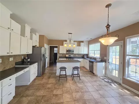 Kitchen - 5232 Tormeall Trce, Suwanee, GA 30024 photo 2 of 2
