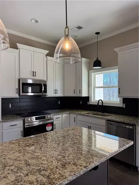 Kitchen - 249 Wilson Rd, Temple, GA 30179 photo 2 of 3