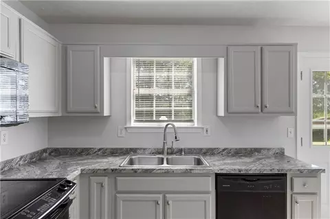 Kitchen - 150 Fairclift Dr, Covington, GA 30016 photo 2 of 2