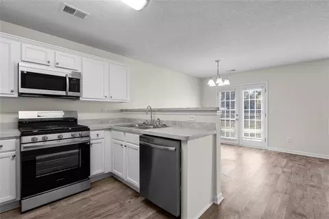 Kitchen - 230 Crestfield Cir, Covington, GA 30016 photo 2 of 2