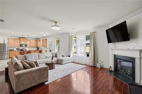 Living - 1406 Stone Ridge Ct, Hampton, GA 30228 photo 2 of 2