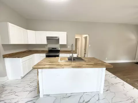 Kitchen - 702 Roosevelt St, Monroe, GA 30656 photo 4 of 6