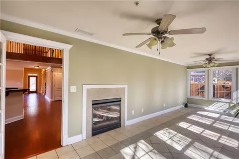 Living - 10110 Malcolm Ct, Covington, GA 30014 photo 10 of 12