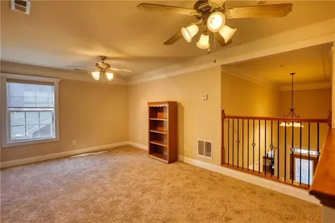 Living - 10110 Malcolm Ct, Covington, GA 30014 photo 11 of 12