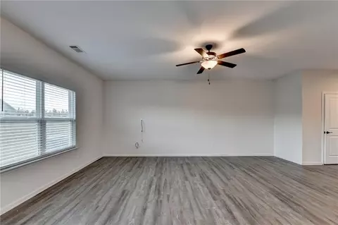 Living - 489 Samara Ct, Fairburn, GA 30213 photo 4 of 6