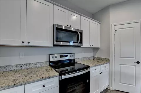 Kitchen - 489 Samara Ct, Fairburn, GA 30213 photo 2 of 7