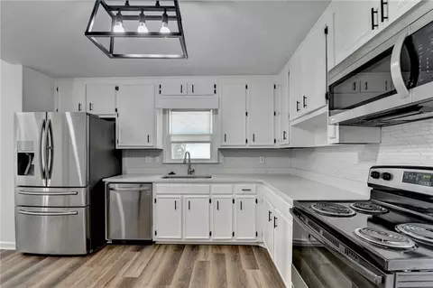 Kitchen - 1530 Plunketts Rd, Buford, GA 30519 photo 2 of 4