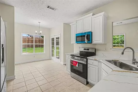 Kitchen - 437 Aviemore Loop, Mcdonough, GA 30253 photo 3 of 3