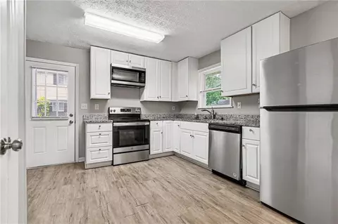 Kitchen - 7788 Marabou Ln, Riverdale, GA 30274 photo 2 of 2