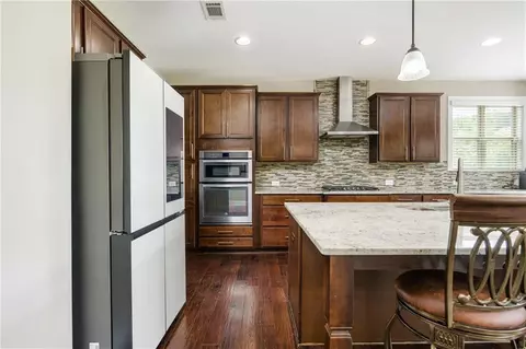 Kitchen - 692 Faraday Cir, Suwanee, GA 30024 photo 3 of 3