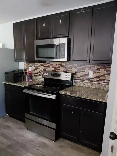 Kitchen - 10 Windbrooke Dr, Covington, GA 30016 photo 2 of 2