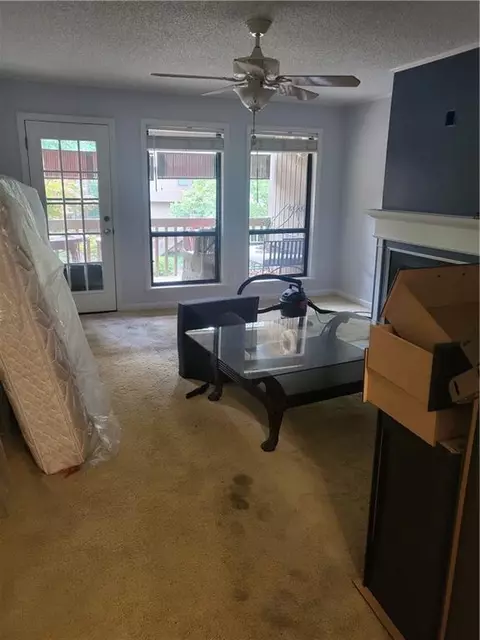 Living - 1102 Pine Tree Dr #1102, Buford, GA 30518 photo 1 of 4