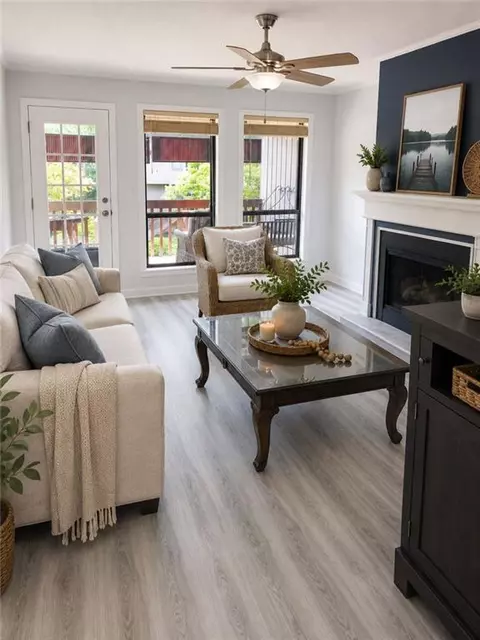 Living - 1102 Pine Tree Dr #1102, Buford, GA 30518 photo 2 of 4