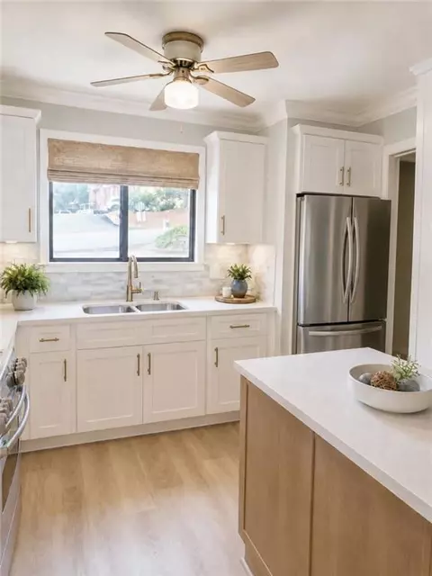 Kitchen - 1102 Pine Tree Dr #1102, Buford, GA 30518 photo 2 of 3