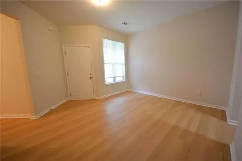 Living - 1550 Persimmon Trce, Morrow, GA 30260 photo 4 of 10