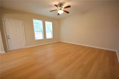 Living - 1550 Persimmon Trce, Morrow, GA 30260 photo 7 of 10