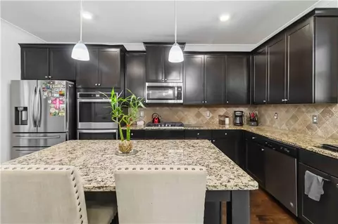 Kitchen - 217 Sebastian Cv, Hampton, GA 30228 photo 2 of 3