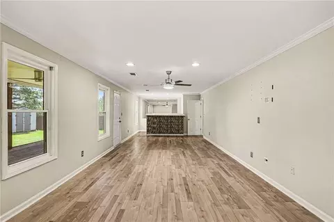 Living - 1391 Buckingham Ct, Hampton, GA 30228 photo 6 of 8
